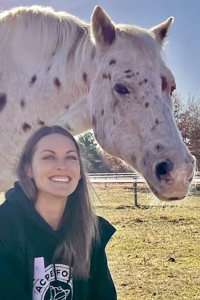 happy-mature-woman-outdoors-casual-gray-sweater